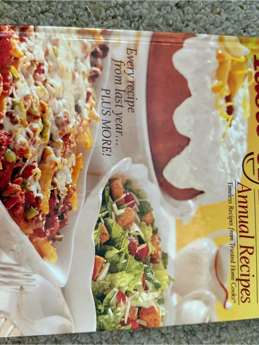 Taste Of Home Cookbook Cover with White, Yellow, Green, Red, Brown